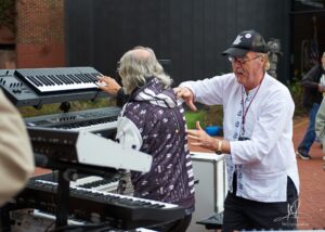 Robeone and Mark "Truey" Trueack in Bob Moog Foundation Park - ProgStock 2023 - Photo by Greg Rawrysz